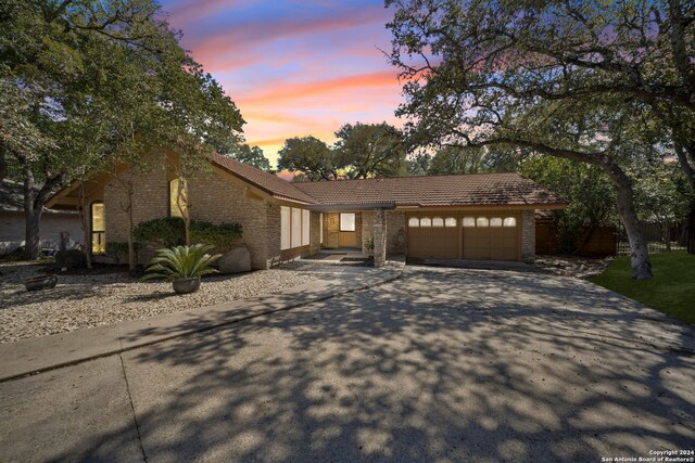 view of front of property with a garage