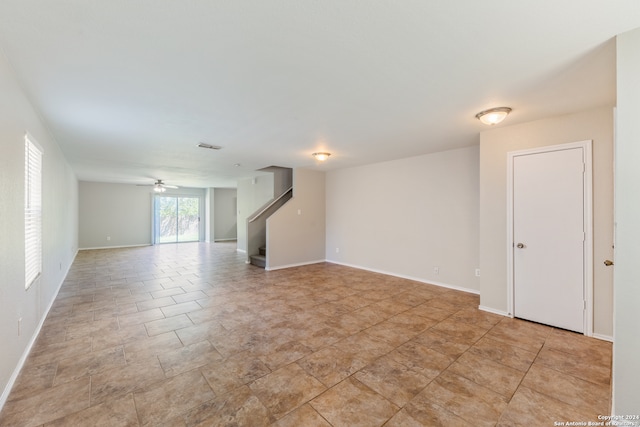 empty room with ceiling fan