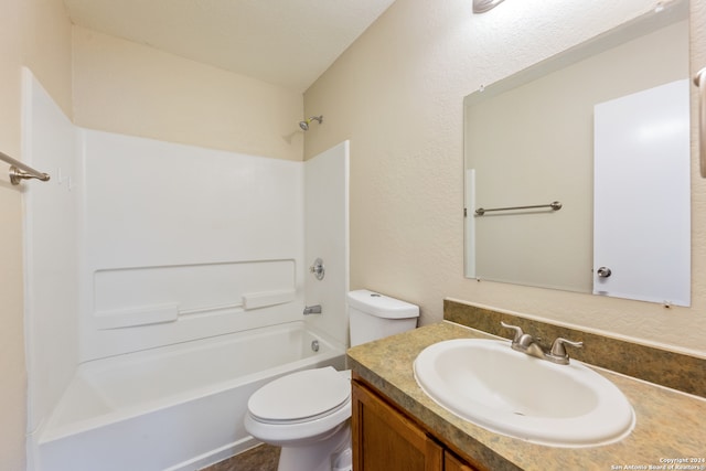 full bathroom with shower / tub combination, vanity, and toilet