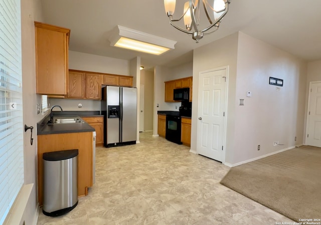 kitchen featuring a chandelier, sink, light carpet, black appliances, and decorative light fixtures