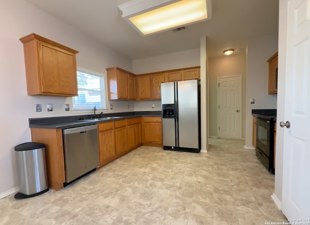 kitchen featuring appliances with stainless steel finishes and sink