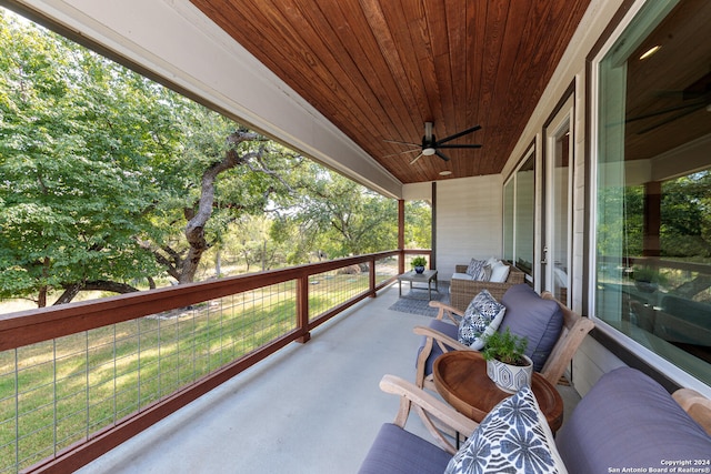 view of patio / terrace with an outdoor hangout area, a balcony, and ceiling fan