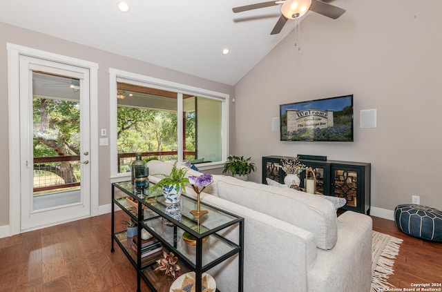 living room featuring high vaulted ceiling, a healthy amount of sunlight, ceiling fan, and hardwood / wood-style floors