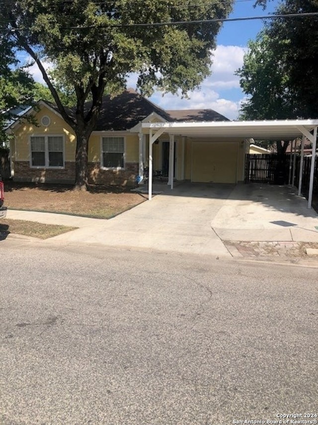 view of front of house featuring a carport