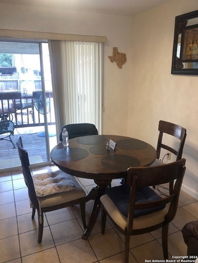 dining room featuring light tile patterned flooring