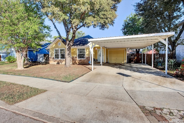 single story home with a carport and a garage