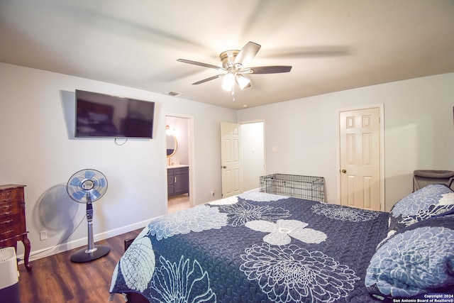 bedroom with ensuite bath, ceiling fan, and dark hardwood / wood-style floors