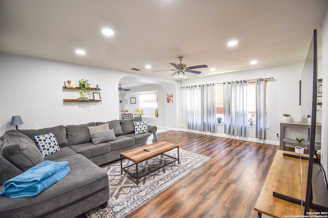 living room with ceiling fan and hardwood / wood-style floors