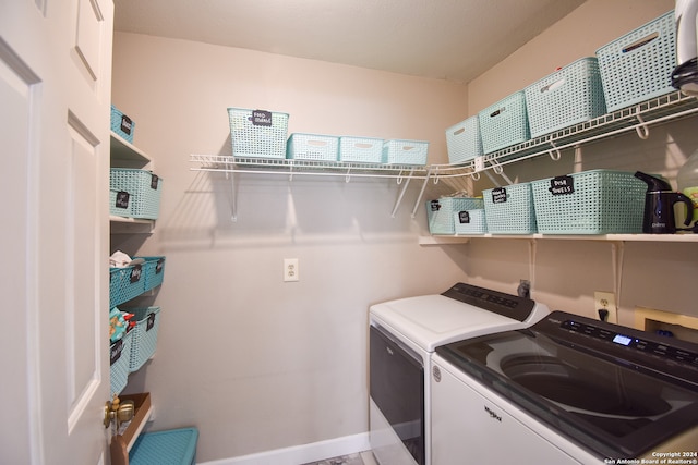 laundry area with washer and clothes dryer