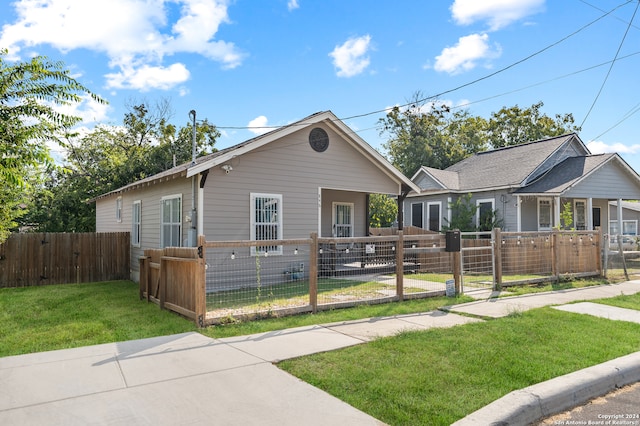 view of front of home with a front yard