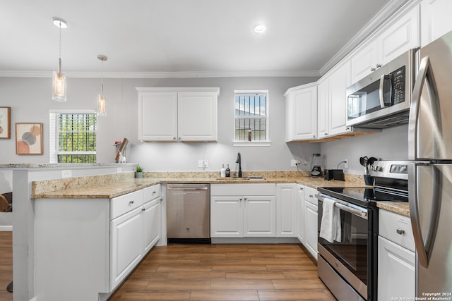 kitchen featuring sink, stainless steel appliances, and white cabinets