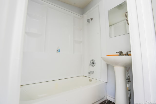 bathroom with tub / shower combination and sink