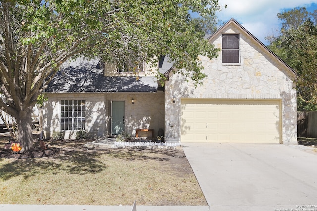 view of front of property featuring a garage