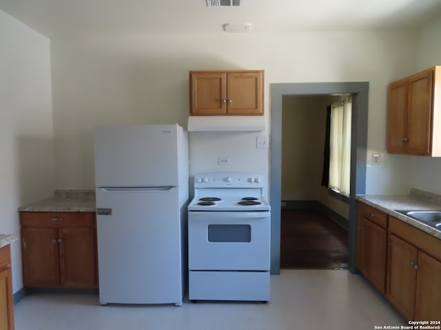 kitchen with white appliances