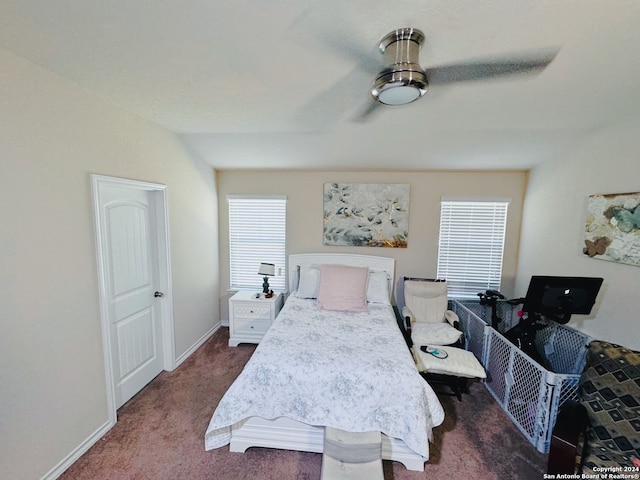 carpeted bedroom featuring ceiling fan