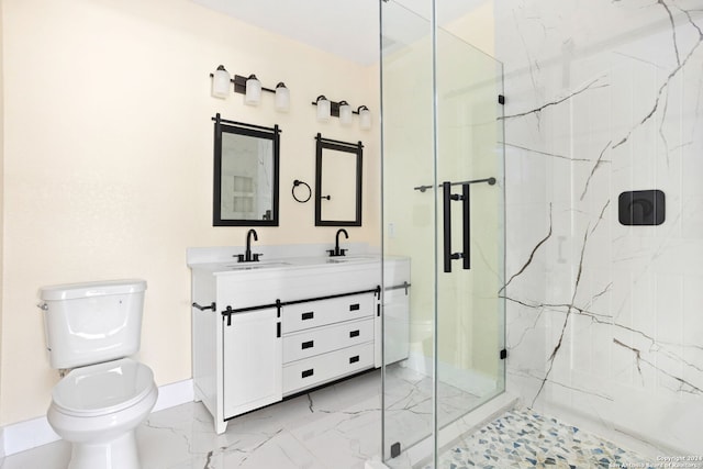 bathroom featuring walk in shower, vanity, and toilet