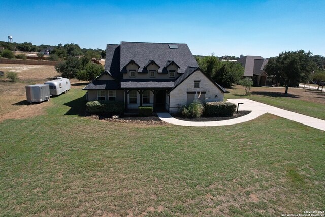 view of front of property with a front lawn