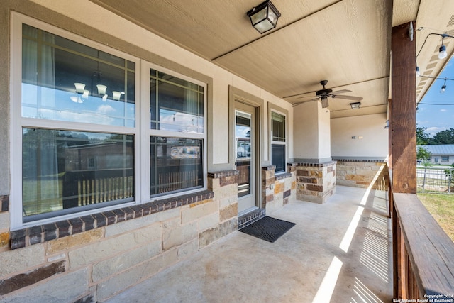 view of patio / terrace featuring ceiling fan