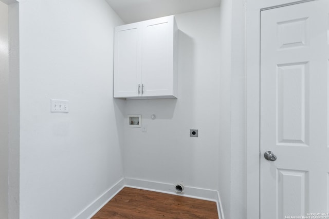 laundry area with dark wood-style floors, baseboards, electric dryer hookup, cabinet space, and washer hookup