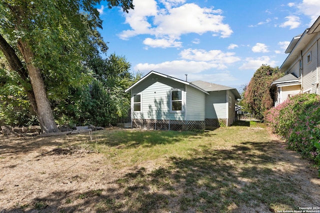 exterior space with a front lawn