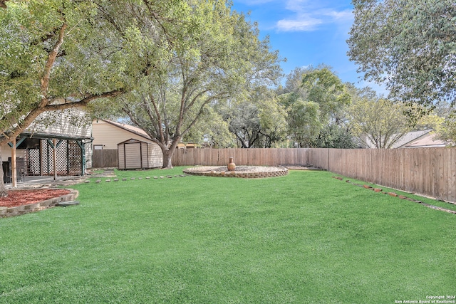 view of yard with a storage shed