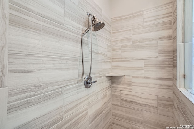 room details with a tile shower