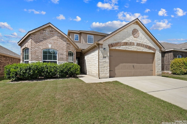 view of front facade with a front lawn and a garage