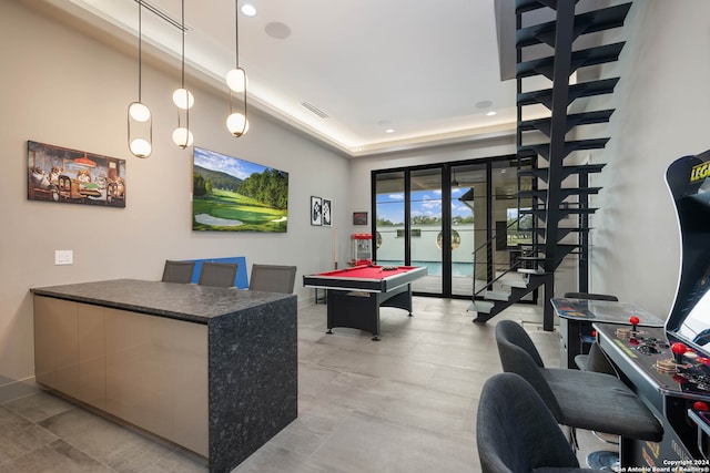 game room with pool table and french doors