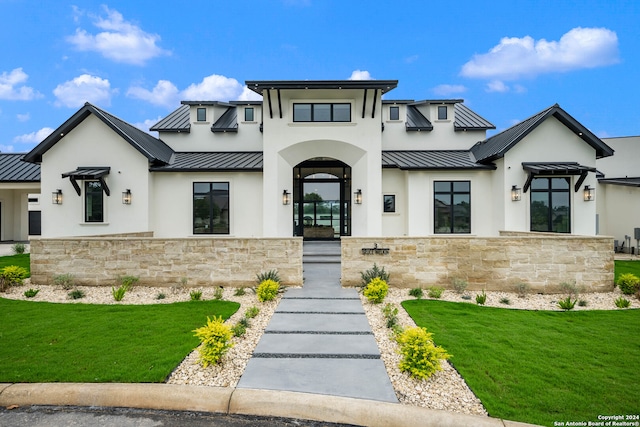 view of front of home with a front yard