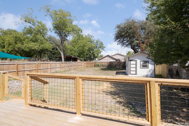 deck featuring a storage unit