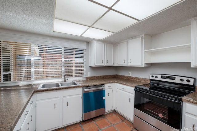 kitchen featuring white cabinets, a textured ceiling, appliances with stainless steel finishes, and sink