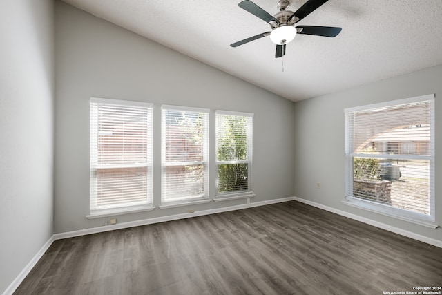 spare room featuring a textured ceiling, vaulted ceiling, ceiling fan, and hardwood / wood-style flooring