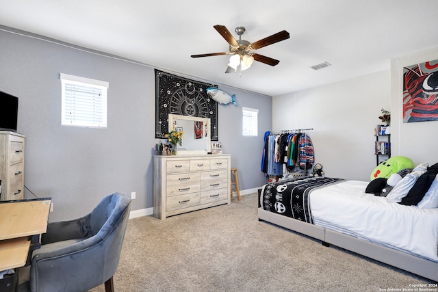 carpeted bedroom with ceiling fan