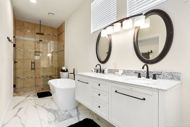 bathroom with independent shower and bath and vanity