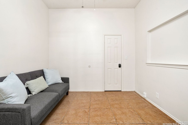 sitting room featuring light tile patterned flooring