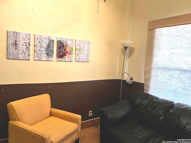 sitting room featuring tile patterned floors