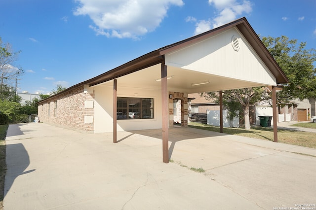 exterior space featuring a carport