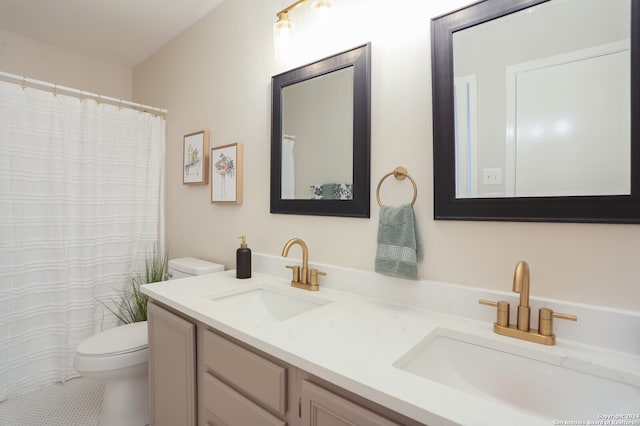 bathroom with tile patterned floors, walk in shower, vanity, and toilet