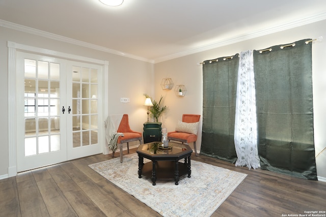 sitting room featuring dark wood-type flooring, french doors, and crown molding