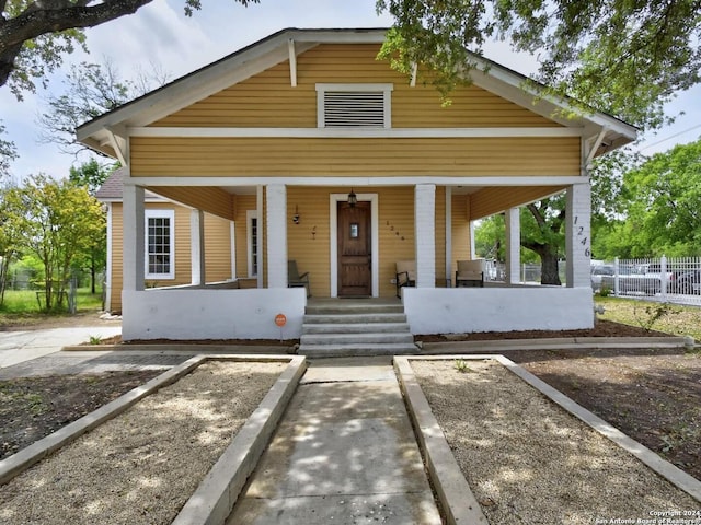 view of front of house featuring covered porch