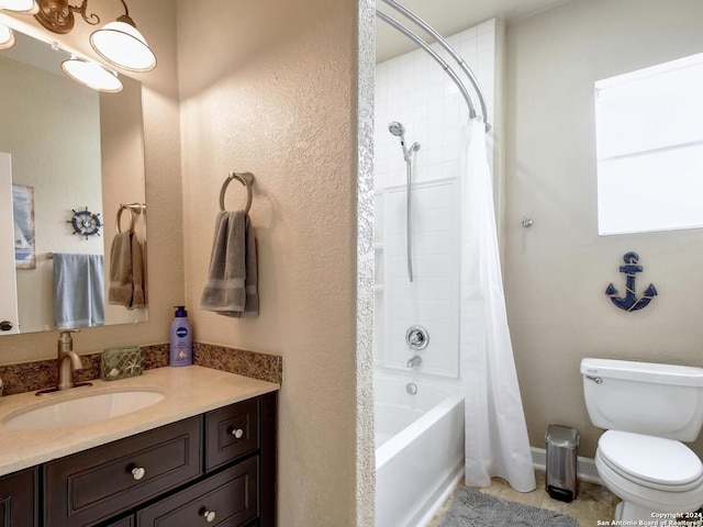 full bathroom with shower / tub combo with curtain, vanity, toilet, and tile patterned floors