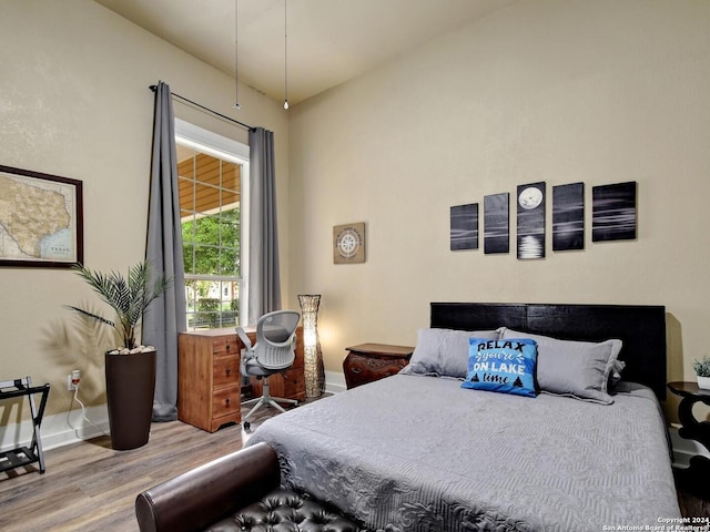 bedroom featuring hardwood / wood-style floors