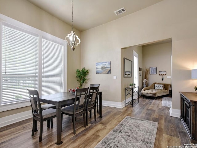 dining area featuring hardwood / wood-style floors