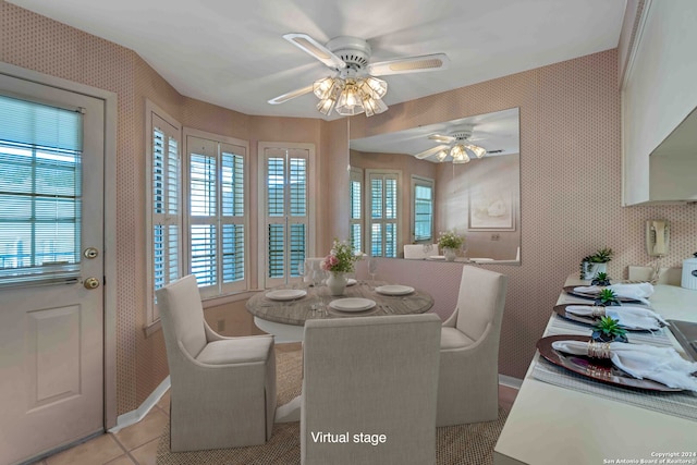 dining area featuring ceiling fan and light tile patterned flooring