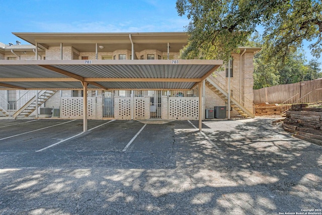 view of parking / parking lot with a carport