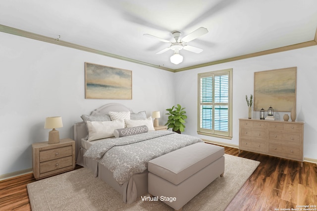 bedroom with crown molding, dark hardwood / wood-style floors, and ceiling fan