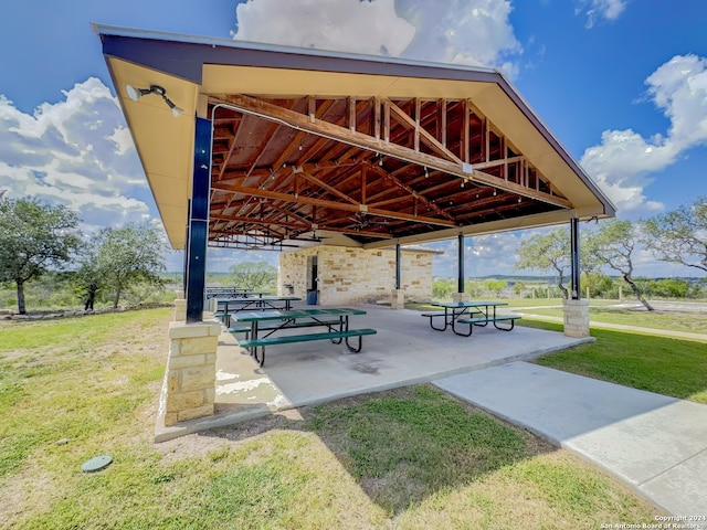 view of property's community with a gazebo and a yard