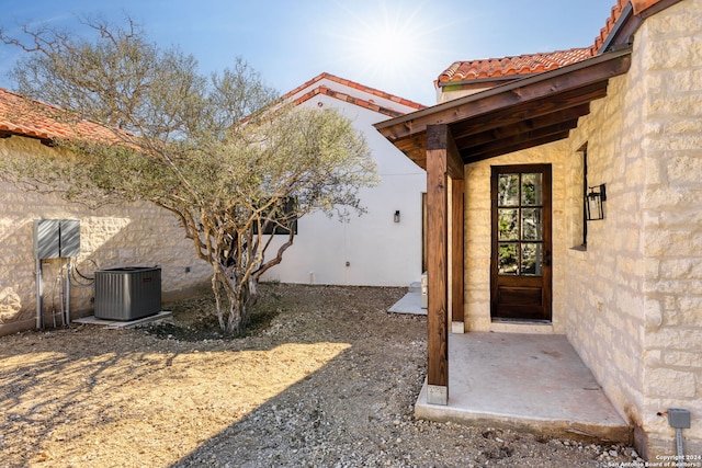 property entrance featuring central air condition unit