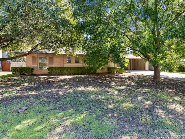 126 Treasure Way, San Antonio, TX 78209 - view of front of house featuring fence and concrete driveway