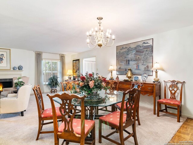 dining space featuring an inviting chandelier